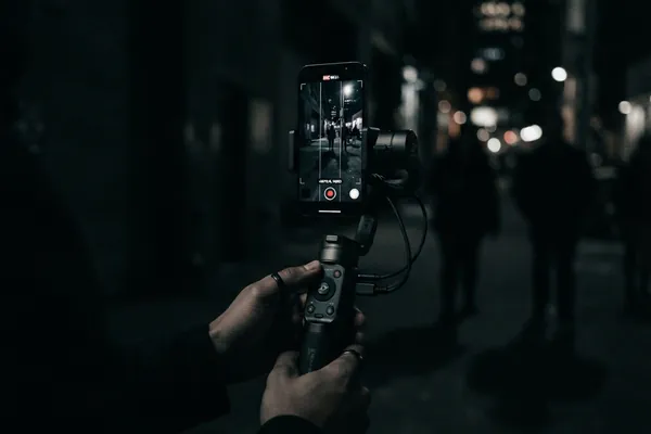 Smartphone on a gimbal recording a short-form reel